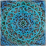 Turquoise handmade tile with decorative relief. Large decorative tile with Mandala design.