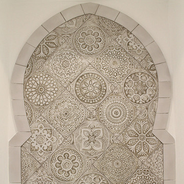 Handmade tile with carved relief for kitchens, bathrooms and outdoor wall art. Decorative tile handmade in Spain.