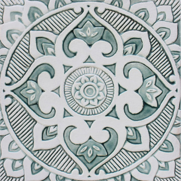 Handmade tile with carved relief for kitchens, bathrooms and outdoor wall art. Decorative tile handmade in Spain.