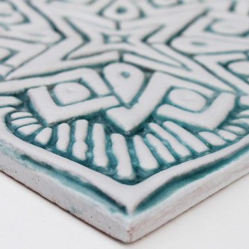 Handmade tile for kitchens, bathrooms and outdoor wall art. Decorative tile handmade in Spain in aqua & white.