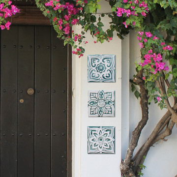 Handmade tile for kitchens, bathrooms and outdoor wall art. Decorative tile handmade in Spain in aqua & white.