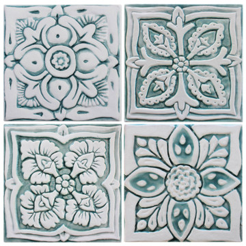 Handmade tile for kitchens, bathrooms and outdoor wall art. Decorative tile handmade in Spain in aqua & white.