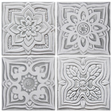 These handmade tiles make wonderful kitchen tiles, bathroom tiles, wall hangings and outdoor wall art.  Grey & white relief tile handmade in Spain.