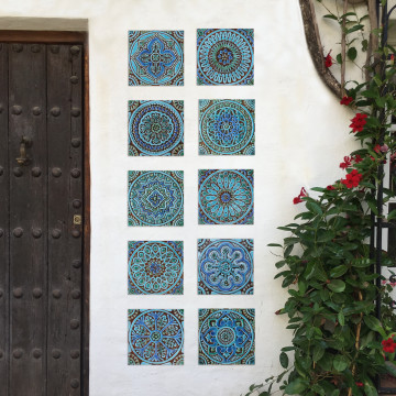 Turquoise handmade tile with decorative relief. Decorative tile handmade in Spain.