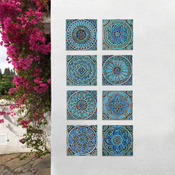 Turquoise handmade tile with decorative relief. Decorative tile handmade in Spain.