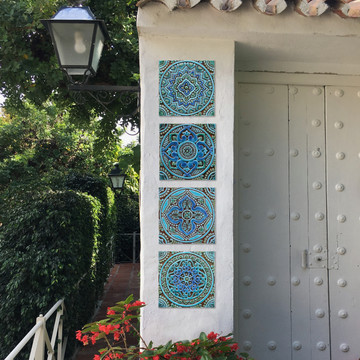 Turquoise handmade tile with decorative relief. Decorative tile handmade in Spain.