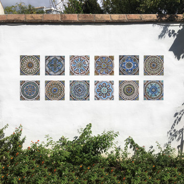 These handmade tiles make wonderful wall hangings and outdoor wall art.  These decorative tiles are handmade in Spain and glazed in matt blue and finished in aged effect.