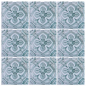 Handmade tile with carved relief for kitchens, bathrooms and outdoor wall art. Decorative tile handmade in Spain in aqua & white.