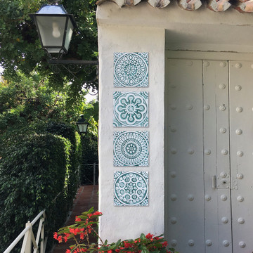 Handmade tile with carved relief for kitchens, bathrooms and outdoor wall art. Decorative tile handmade in Spain in aqua & white.