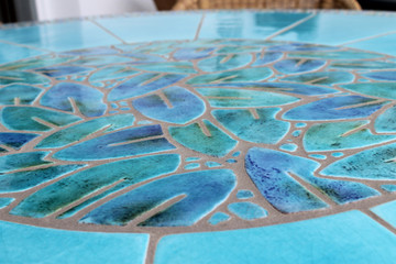 Mosaic table made from Handmade tiles.  Custom designed ceramic table, handmade in Spain.