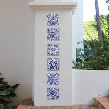 Handmade tile for kitchens, bathrooms and outdoor wall art. Decorative tile handmade in Spain. Relief tile glazed in blue and white.