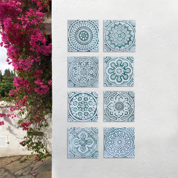 Handmade tile for kitchens, bathrooms and outdoor wall art. Decorative tile handmade in Spain. Relief tile glazed in aqua and white.