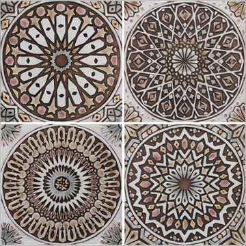 These decorative tiles make wonderful wall hangings and outdoor wall art.  These handmade Spanish tiles are carved in relief and glazed in matt brown and finished in aged effect.