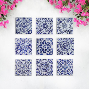 Blue and white handmade tile with relief for kitchens bathrooms and outdoor wall art. Decorative tile handmade in Spain.