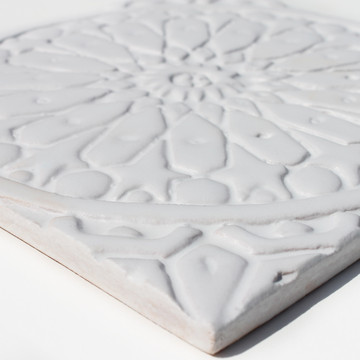 These handmade tiles make wonderful kitchen tiles, bathroom tiles, wall decor and outdoor wall art.  White relief tile handmade in Spain.