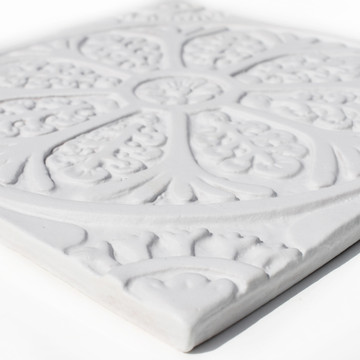 These handmade tiles make wonderful kitchen tiles, bathroom tiles, wall decor and outdoor wall art.  White relief tile handmade in Spain.