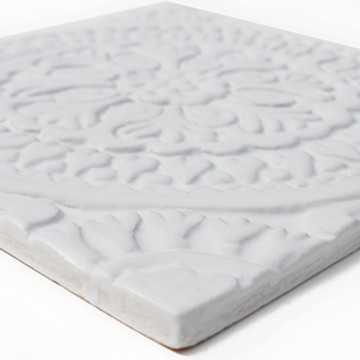 These handmade tiles make wonderful kitchen tiles, bathroom tiles, wall decor and outdoor wall art.  White relief tile handmade in Spain.