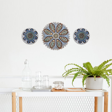 Create your unique wall art installation with these circular handmade tiles. Ceramic wall art for kitchens, bathrooms and outdoor wall decor. Our decorative tiles make a beautiful wall art installations when combined together.