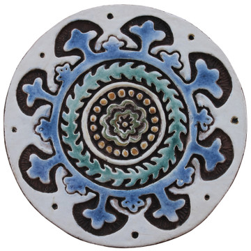 Create your unique wall art installation with these circular handmade tiles. Ceramic wall art for kitchens, bathrooms and outdoor wall decor. Our decorative tiles make a beautiful wall art installations when combined together.