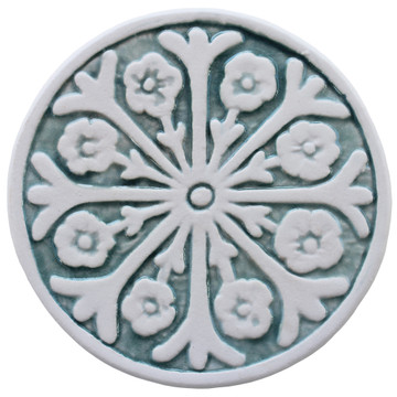 These circular tiles make beautiful outdoor wall art.  Ceramic wall art for kitchens, bathrooms and wall decor. Our decorative tiles can also be combined with our other handmade tiles to make larger wall art installations.