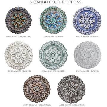 These circular tiles make beautiful outdoor wall art.  Ceramic wall art for kitchens, bathrooms and wall decor. Our decorative tiles can also be combined with our other handmade tiles to make larger wall art installations.