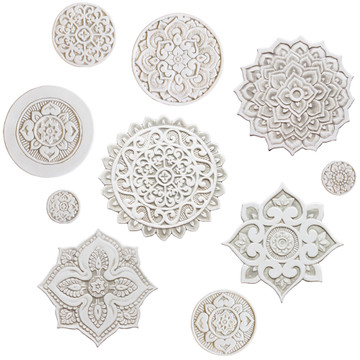 These circular tiles make beautiful outdoor wall art.  Ceramic wall art for kitchens, bathrooms and wall decor. Our decorative tiles can also be combined with our other handmade tiles to make larger wall art installations.