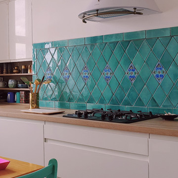 Kitchen backsplash using handmade tiles by GVega.  Handmade in Spain.