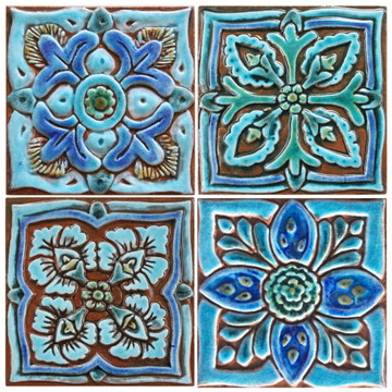Turquoise handmade tile with decorative relief. Decorative tile handmade in Spain.