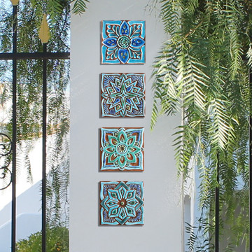 Turquoise handmade tile with decorative relief. Decorative tile handmade in Spain.