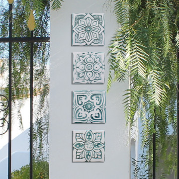 Handmade tile with carved relief for kitchens, bathrooms and outdoor wall art. Decorative tile handmade in Spain in aqua & white.