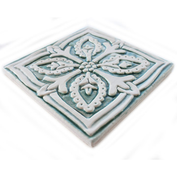 Handmade tile for kitchens, bathrooms and outdoor wall art. Decorative tile handmade in Spain in aqua & white.