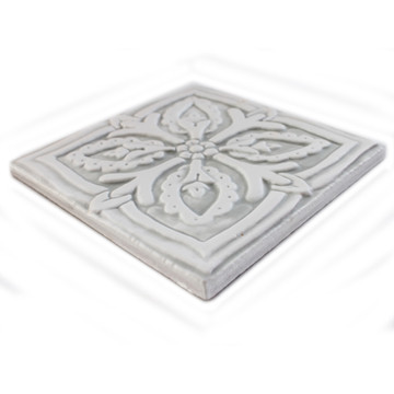 Handmade tile for kitchens, bathrooms and outdoor wall art. Decorative tile handmade in Spain. Relief tile glazed in grey and white.