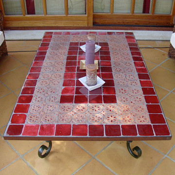 Mosaic table made from Handmade tiles.  Custom designed ceramic table, handmade in Spain.