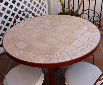 Mosaic table made from Handmade tiles.  Custom designed ceramic table, handmade in Spain.