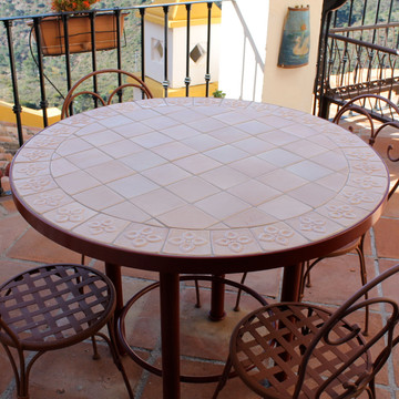 Mosaic table made from Handmade tiles.  Custom designed ceramic table, handmade in Spain.