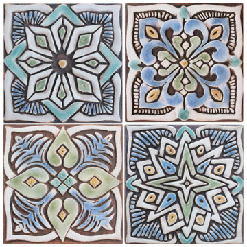 These handmade tiles make wonderful wall hangings and outdoor wall art.  Matt blue decorative tile handmade in Spain.