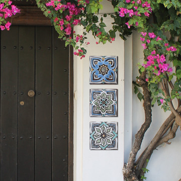 These handmade tiles make wonderful wall hangings and outdoor wall art.  Matt blue decorative tile handmade in Spain.