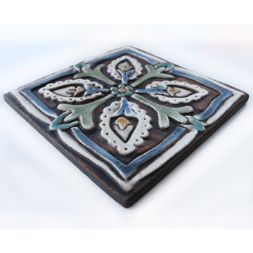 These handmade tiles make wonderful wall hangings and outdoor wall art.  Matt blue decorative tile handmade in Spain.