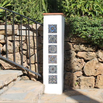 These handmade tiles make wonderful wall hangings and outdoor wall art.  Matt blue decorative tile handmade in Spain.