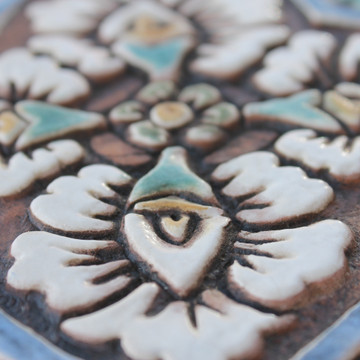 These handmade tiles make wonderful wall hangings and outdoor wall art.  Matt blue decorative tile handmade in Spain.