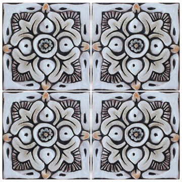 These decorative tiles make wonderful wall hangings and outdoor wall art.  These handmade Spanish tiles are carved in relief and glazed in matt brown.