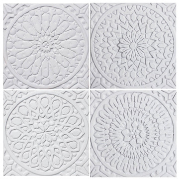 These handmade tiles are for kitchens and bathrooms.  These decorative tiles also make wonderful wall hangings and outdoor wall art.  Our white relief tiles are handmade in Spain.