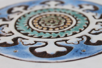 These circular handmade tiles make unique wall hangings for kitchens, bathrooms or outdoor wall art. Our decorative tiles can also be combined with our other circular tiles to make larger wall art installations.