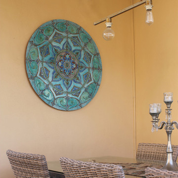 Our ceramic murals make unique wall art for your garden or patio walls. Our tiles are handmade in Spain.