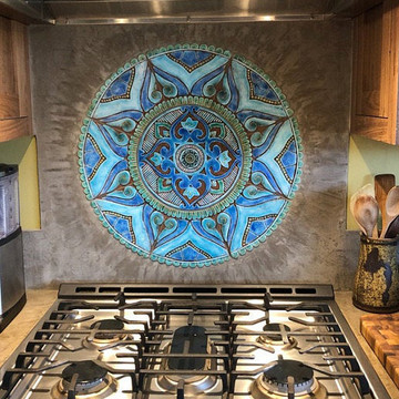 Our ceramic murals make unique wall art for your garden or patio walls. Our tiles are handmade in Spain.