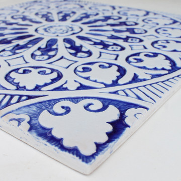 Large ceramic tile handmade in Spain. Blue and white decorative tile for kitchens, bathrooms or outdoor wall art.