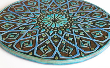 These circular handmade tiles make unique wall hangings for kitchens, bathrooms or outdoor wall art. Our turquoise decorative tiles can also be combined with our many other circular tiles to make larger wall art installations.
