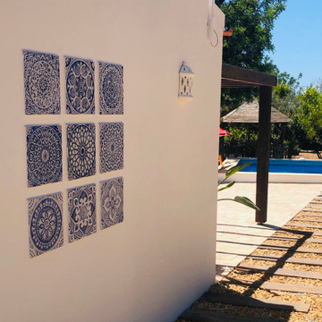 Blue and white tiles, outdoor wall art installation