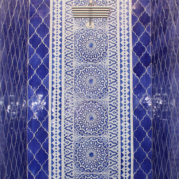 Luxury bathroom with blue and white handmade tile with relief. Decorative tile handmade in Spain.