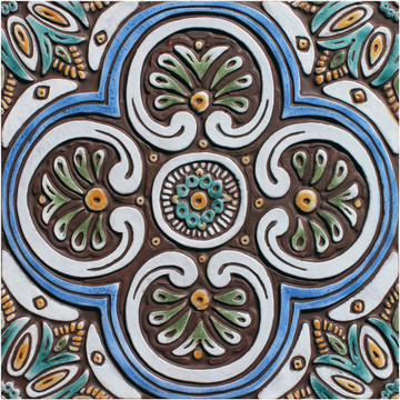 Large Spanish tile glazed in matt blues and greens